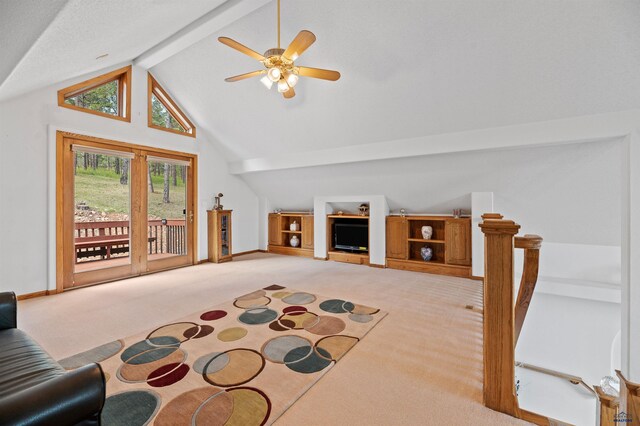 living room with beam ceiling, high vaulted ceiling, ceiling fan, and light colored carpet