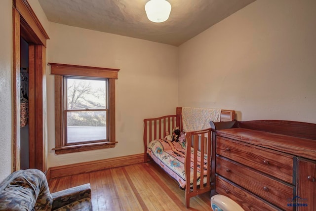 bedroom featuring light wood-type flooring