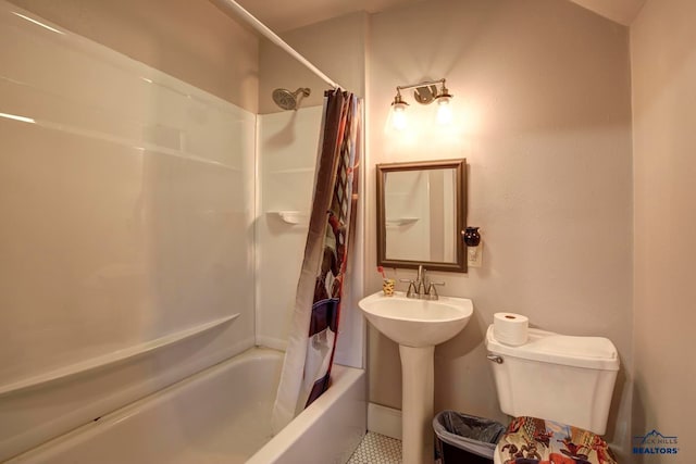 bathroom featuring tile floors, shower / bath combo with shower curtain, and toilet