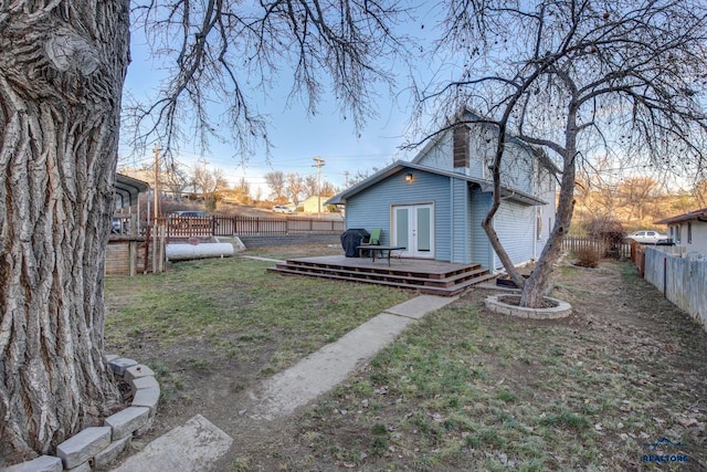 view of yard with a deck