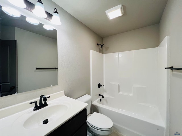 full bathroom with toilet, shower / bathing tub combination, and vanity