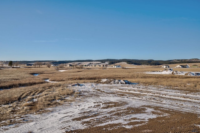 exterior space with a rural view