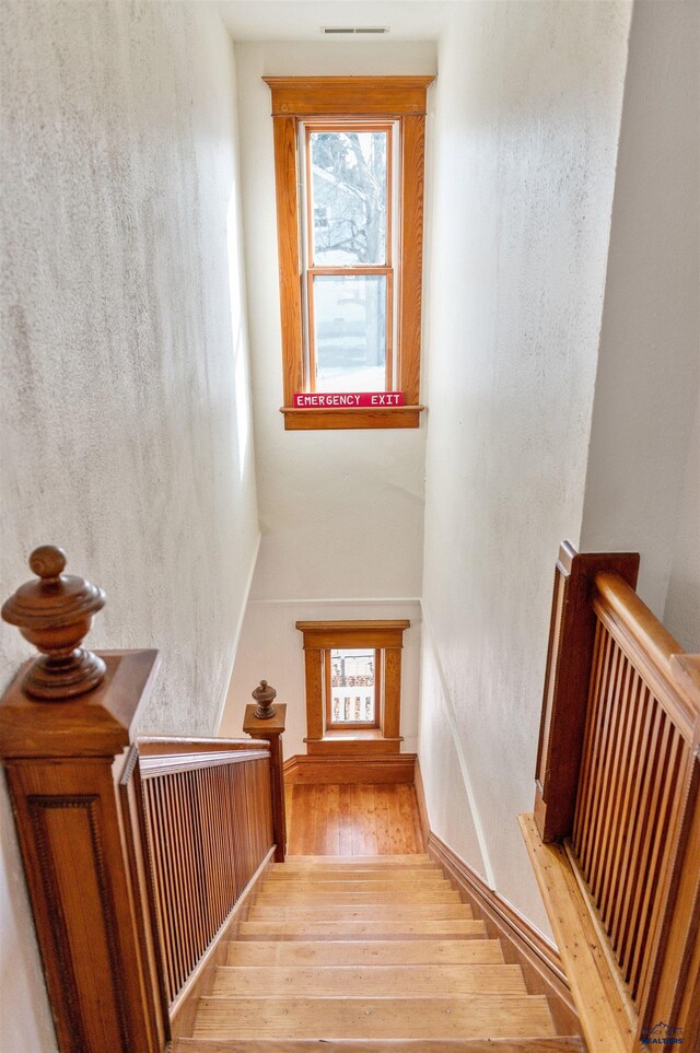 735 8th, Spearfish, SD 57783 - stairway featuring light hardwood / wood-style floors