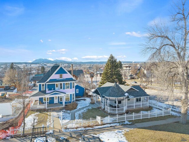 735 8th, Spearfish, SD 57783 - snowy aerial view featuring a mountain view