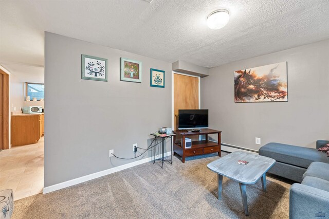 735 8th, Spearfish, SD 57783 - living room with a baseboard radiator, carpet floors, and a textured ceiling