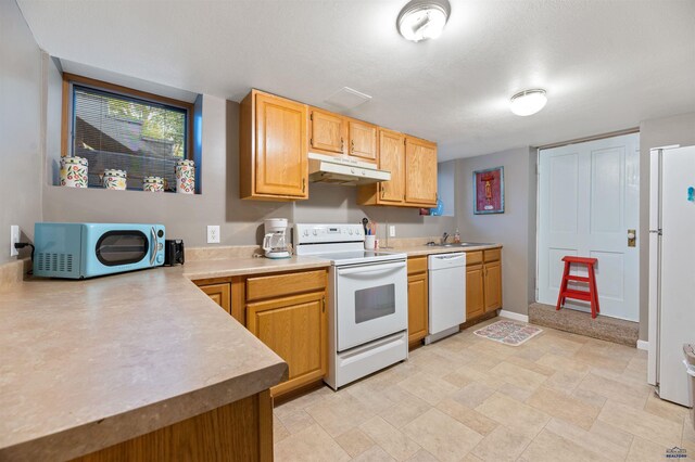 735 8th, Spearfish, SD 57783 - kitchen with sink, white appliances, and light tile floors
