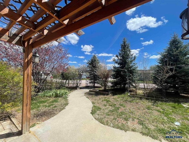 view of yard with a pergola