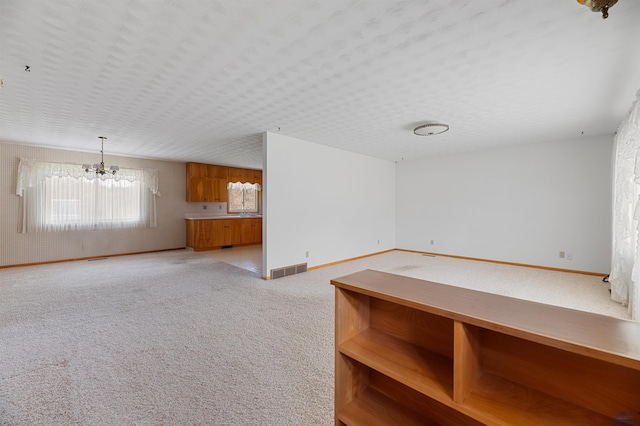 interior space with an inviting chandelier