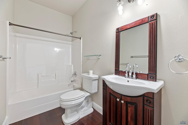 full bathroom with tub / shower combination, wood-type flooring, vanity, and toilet