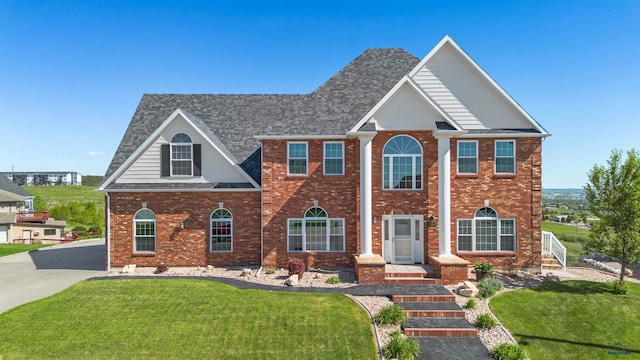 view of front of property with a front lawn