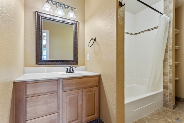 bathroom with shower / bath combo with shower curtain, vanity, and tile flooring