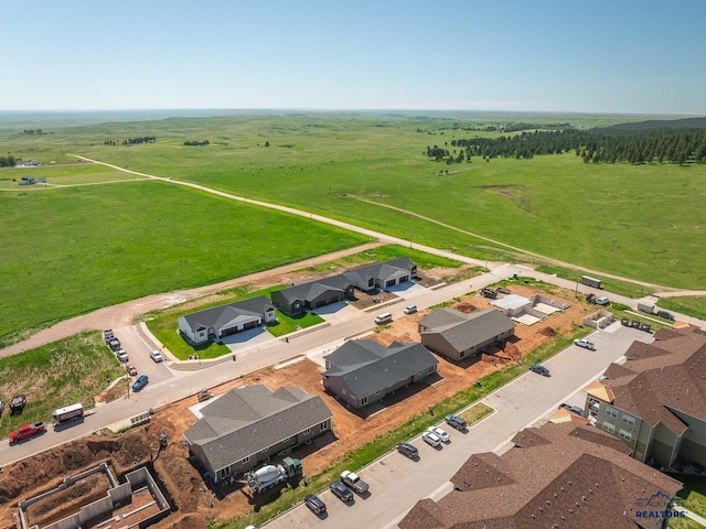 birds eye view of property featuring a rural view