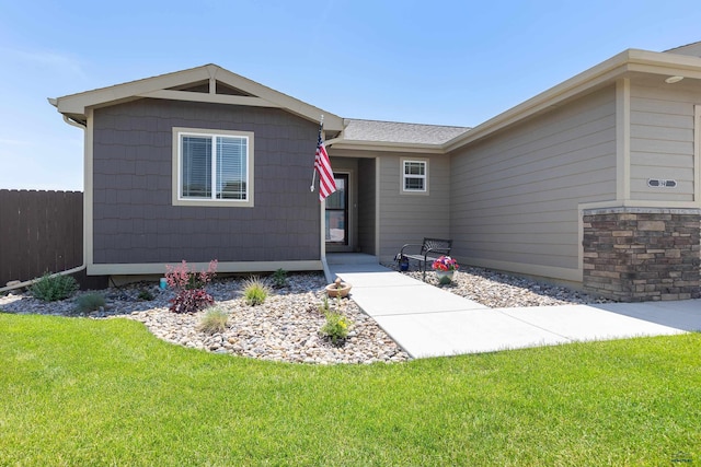 view of front of property with a front lawn