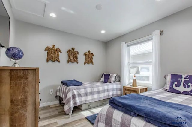 bedroom with light hardwood / wood-style floors