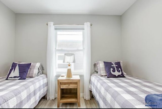 bedroom featuring light hardwood / wood-style floors