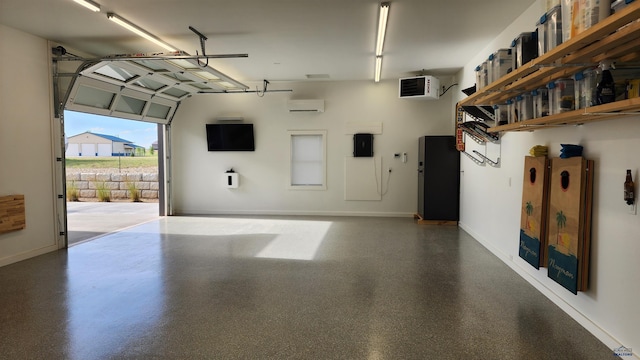 garage featuring a wall unit AC