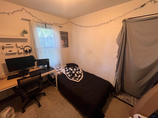 carpeted bedroom with a textured ceiling