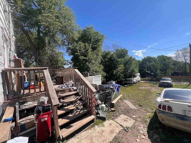 view of yard with a wooden deck