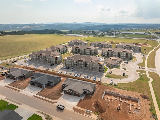 drone / aerial view featuring a mountain view