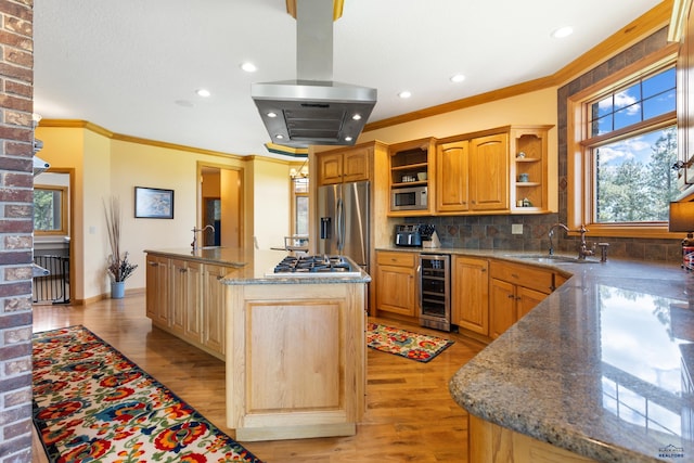 kitchen with wine cooler, tasteful backsplash, an island with sink, island exhaust hood, and stainless steel appliances