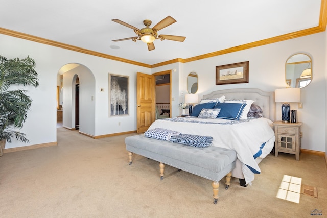 carpeted bedroom with crown molding and ceiling fan