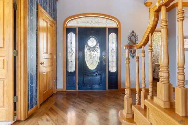 entrance foyer with hardwood / wood-style floors