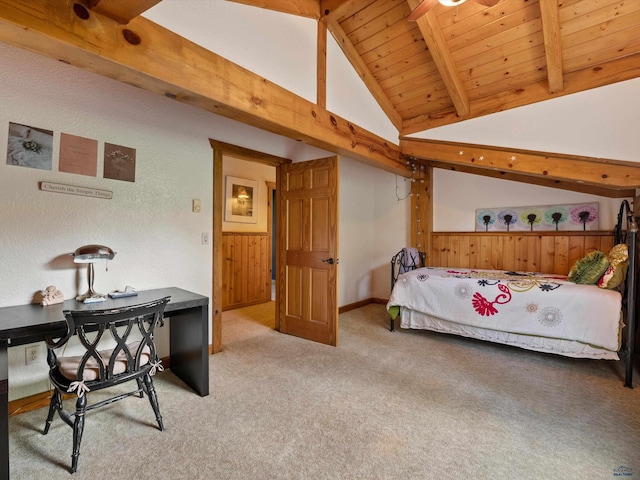 carpeted bedroom featuring lofted ceiling with beams and wood ceiling