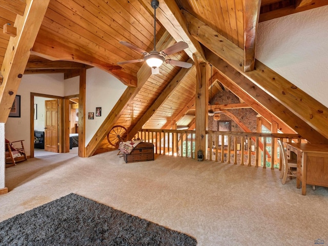 additional living space featuring lofted ceiling with beams, carpet, wood ceiling, and ceiling fan