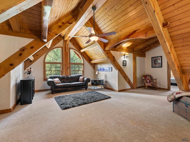 carpeted living room featuring lofted ceiling with beams, wood ceiling, and ceiling fan