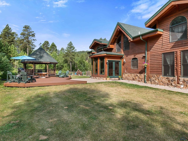 view of yard with a gazebo and a deck