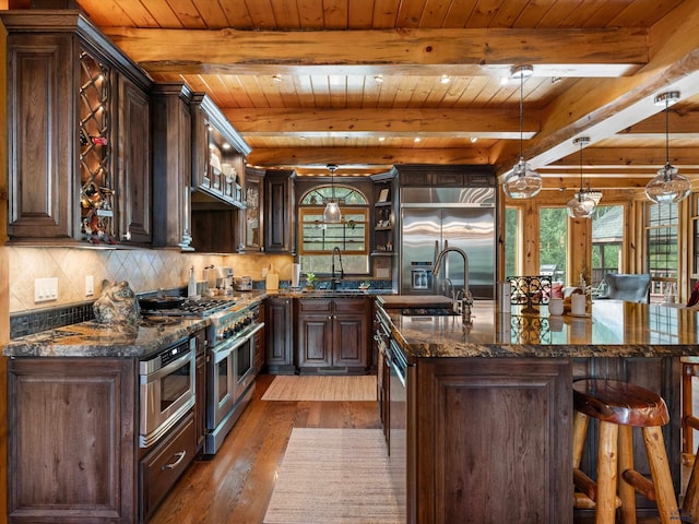 kitchen with beam ceiling, backsplash, and wood ceiling