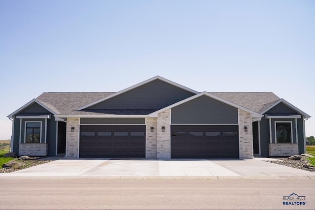 view of front of house featuring a garage and driveway