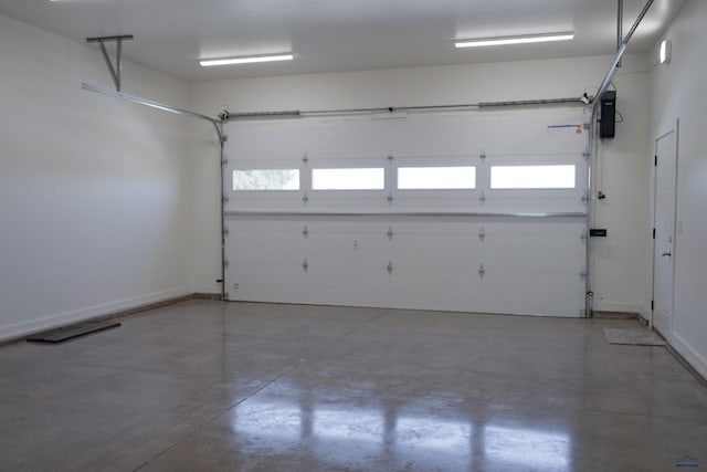 garage with baseboards