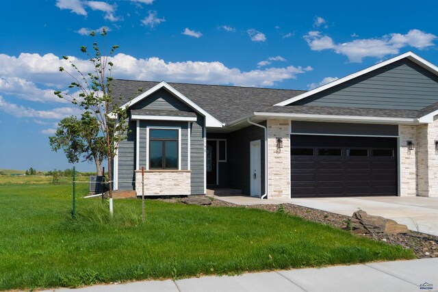 1150 Single Tree Dr Lot 23B, Piedmont, SD 57769 - single story home with an attached garage, concrete driveway, a front lawn, and a shingled roof