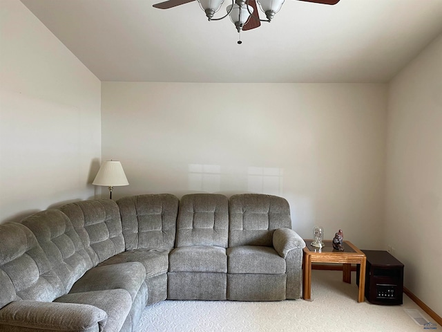 living room with carpet and ceiling fan