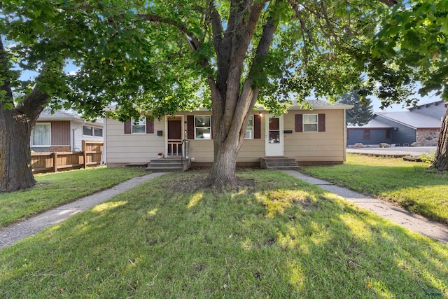 ranch-style house with a front yard