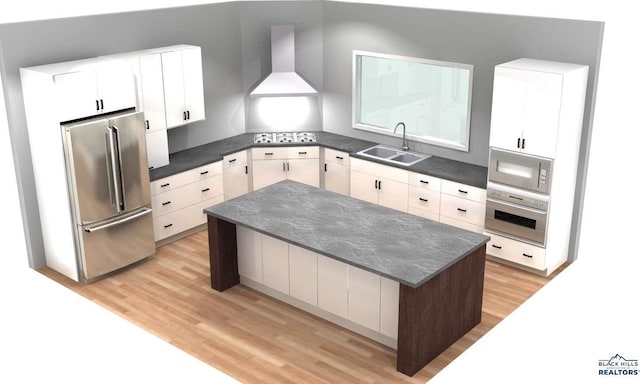 kitchen featuring stainless steel appliances, wall chimney exhaust hood, sink, light wood-type flooring, and white cabinets