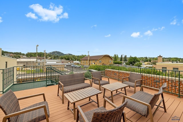 619 Mt Rushmore Rd, Custer, SD 57730 - wooden terrace with a mountain view