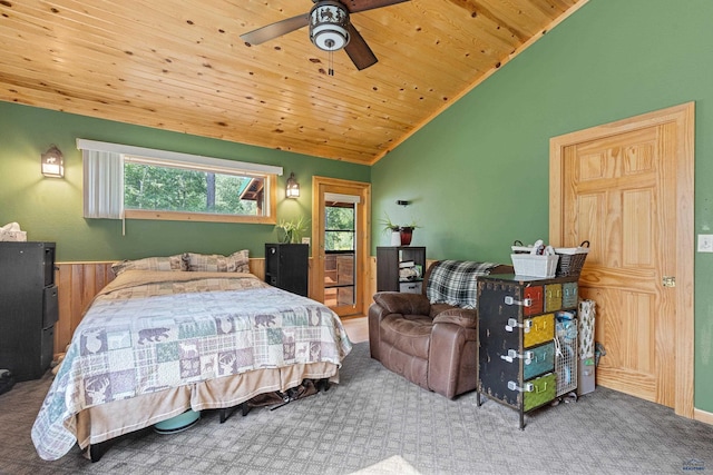 bedroom featuring ceiling fan, carpet, wooden ceiling, and lofted ceiling