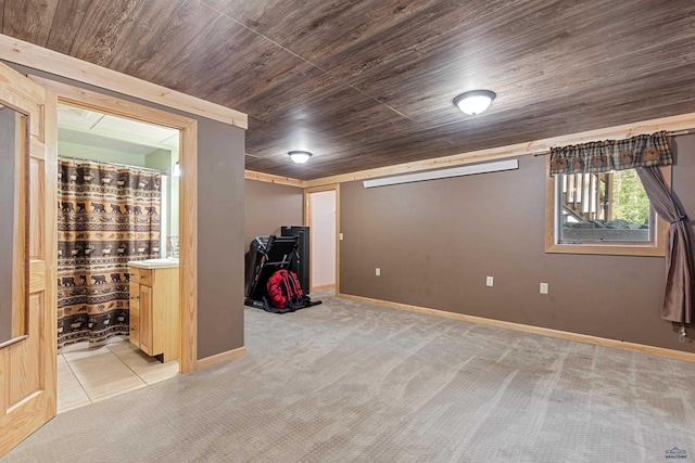 interior space featuring wood ceiling and light colored carpet