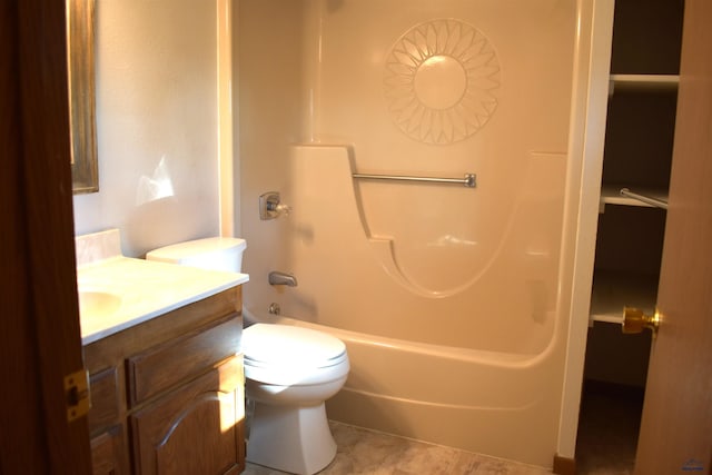 full bathroom with tile patterned flooring, toilet, shower / bathing tub combination, and vanity