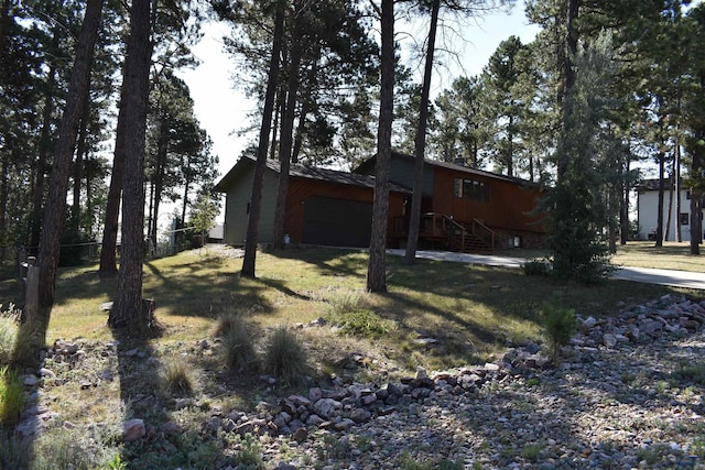 view of property exterior featuring a garage