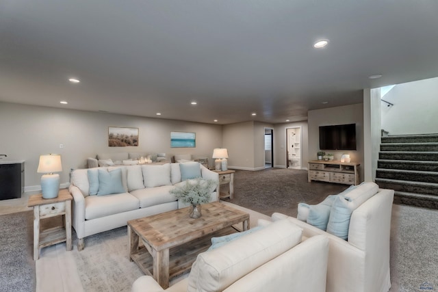 living room featuring light colored carpet