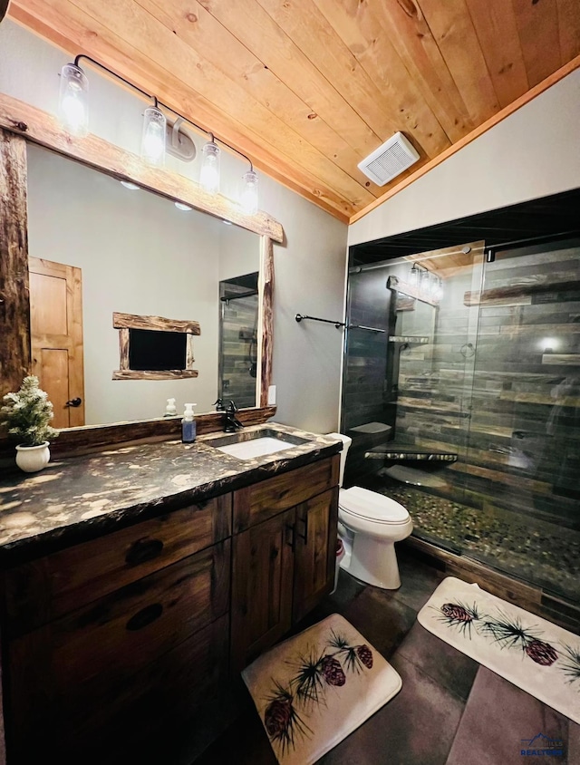 bathroom featuring an enclosed shower, wooden ceiling, toilet, lofted ceiling, and vanity