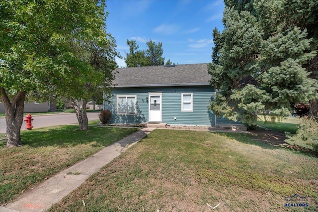 view of front of house with a front yard