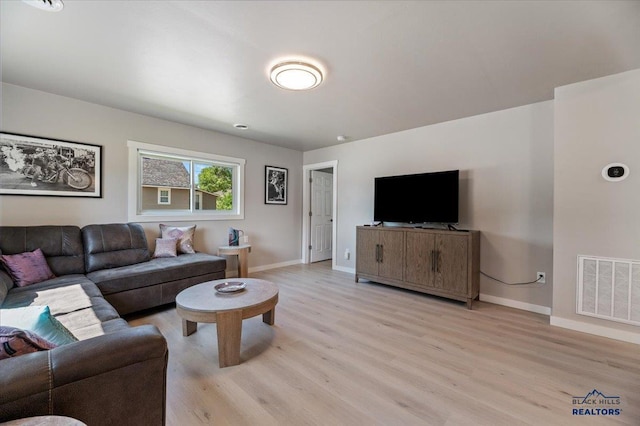 living room featuring light hardwood / wood-style floors