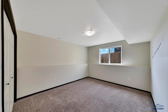 view of carpeted spare room