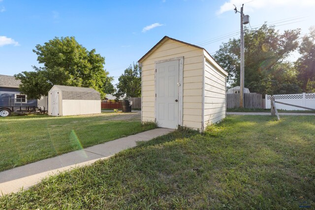 view of outdoor structure featuring a yard