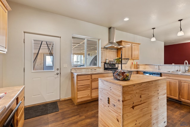 kitchen featuring wood counters, wall chimney range hood, light brown cabinets, dark wood-type flooring, and a kitchen island