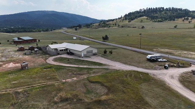 bird's eye view with a rural view and a mountain view